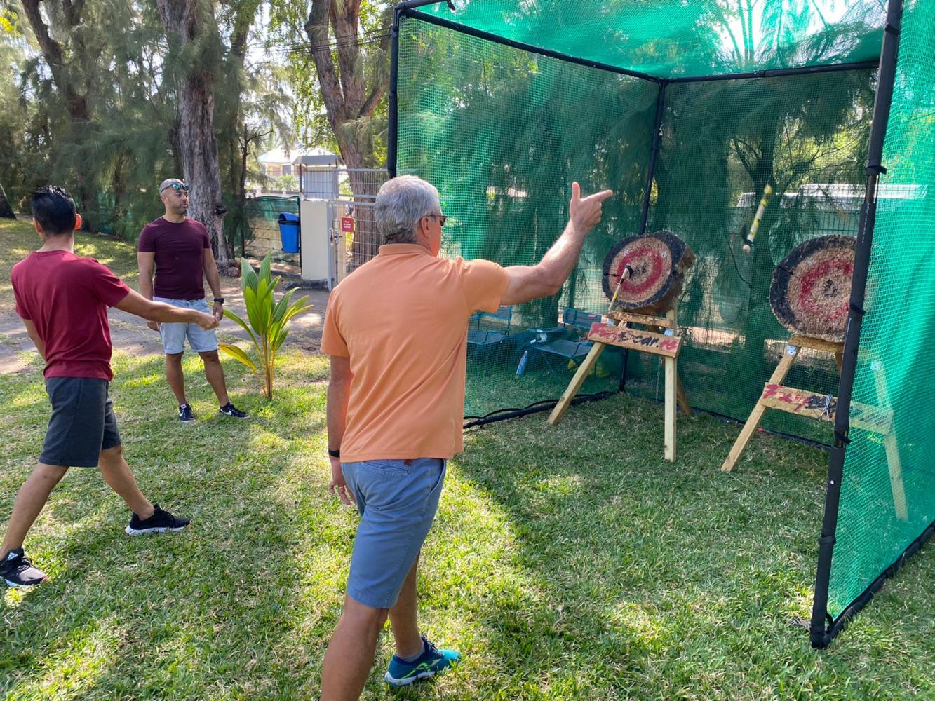 An axe-throwing stand at your event