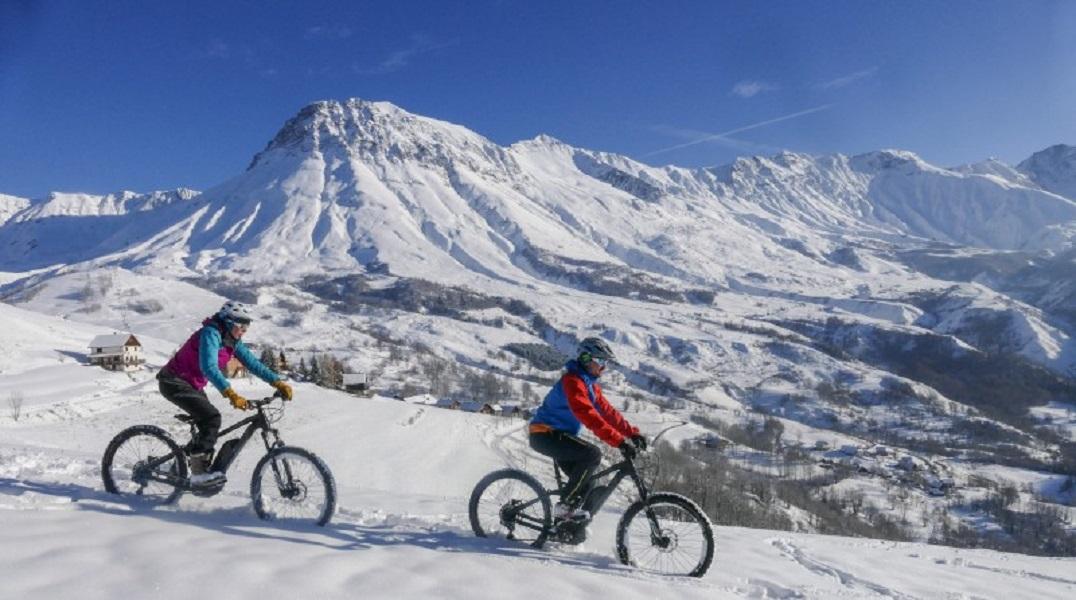 An electric mountain bike ride on snow