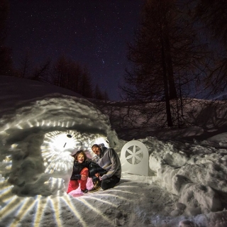 A night in an igloo with a 1-hour night hike (and dinner at a restaurant)